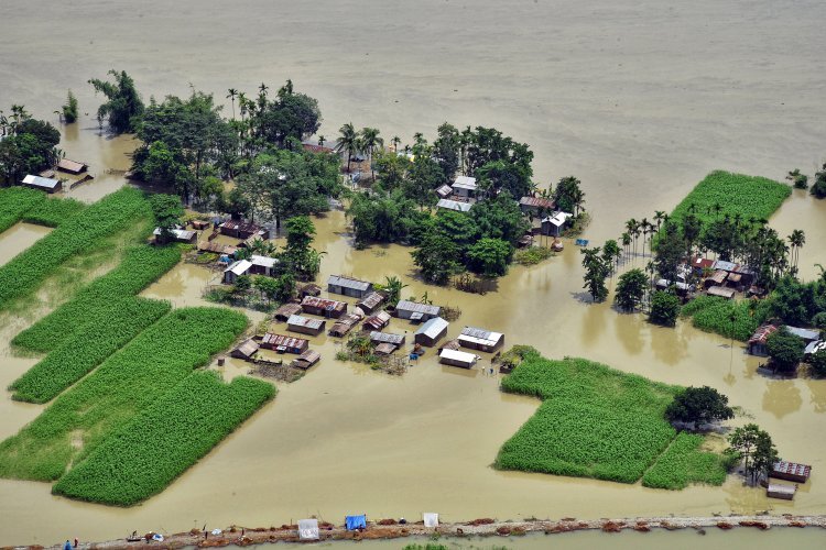 Why is Assam flooded most of the time?